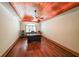 Bright office with hardwood floors, recessed lighting, and unique coffered ceiling at 835 Timber Lake Trl, Cumming, GA 30041