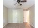 Bedroom with neutral carpet, ceiling fan, and a bright window at 3110 Ashly Cove Ln, Snellville, GA 30078