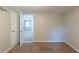 Carpeted bedroom featuring natural light with an open door to another room at 3110 Ashly Cove Ln, Snellville, GA 30078