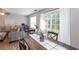 Cozy dining area with a wooden table, chairs, and access to outdoor space at 183 Venture Path, Hiram, GA 30141