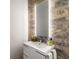 Well lit bathroom features a stone accent wall and modern vanity at 4569 Fountain Ne Dr, Marietta, GA 30067