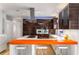 Well-appointed kitchen with stainless steel appliances, custom wood cabinets, and an orange island at 4569 Fountain Ne Dr, Marietta, GA 30067