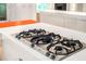 Modern cooktop integrated into white countertops at 4569 Fountain Ne Dr, Marietta, GA 30067