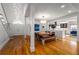 Open-concept living space showcasing hardwood floors, bright dining area, and a modern kitchen at 4569 Fountain Ne Dr, Marietta, GA 30067