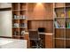 A well-stocked study with a desk and bookshelves at 4569 Fountain Ne Dr, Marietta, GA 30067