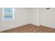Inviting bedroom with hardwood floors, window for natural light, and modern finishes for relaxing comfort at 1181 Fairview Ne Rd, Atlanta, GA 30306