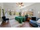 This stylish bedroom boasts ample natural light, a ceiling fan, hardwood floors, and modern furnishings at 1181 Fairview Ne Rd, Atlanta, GA 30306
