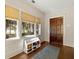 Welcoming entryway featuring wood floors, a shoe rack, and natural light from windows near the front door at 1181 Fairview Ne Rd, Atlanta, GA 30306