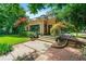 Exterior home view showcasing the manicured lawn and front steps leading to the entrance at 1181 Fairview Ne Rd, Atlanta, GA 30306
