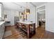 Bright kitchen features a large island with seating, stainless appliances, and access to other living areas at 1181 Fairview Ne Rd, Atlanta, GA 30306