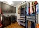 Well-organized laundry area with modern appliances, plenty of storage and hanging space, and wood floors at 1181 Fairview Ne Rd, Atlanta, GA 30306
