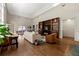 Spacious living area with hardwood floors, custom shelving, and lots of natural light at 1181 Fairview Ne Rd, Atlanta, GA 30306