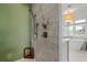 Modern shower with marble tile, rainfall showerhead, and adjacent soaking tub for spa-like experience at 1181 Fairview Ne Rd, Atlanta, GA 30306