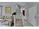 Comfortable living room with staircase and ample natural light at 200 Mona Ct, Lawrenceville, GA 30044