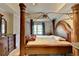 Large main bedroom featuring decorative furniture and ample natural light at 200 Mona Ct, Lawrenceville, GA 30044