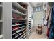 Custom closet with shelves and drawers offers ample storage for shoes, handbags and other accessories at 2525 Peachtree Rd # 28, Atlanta, GA 30305