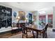 Formal dining room featuring a wooden table set, tasteful artwork, and natural light from skylights at 2525 Peachtree Rd # 28, Atlanta, GA 30305