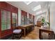 Hallway with shutters, skylights and wooden table at 2525 Peachtree Rd # 28, Atlanta, GA 30305