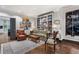Cozy living room with hardwood floors, built-in shelves, and comfortable seating at 2525 Peachtree Rd # 28, Atlanta, GA 30305