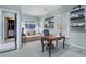 Office space that includes shelves, a desk, an adjacent daybed, and a closet at 2525 Peachtree Rd # 28, Atlanta, GA 30305