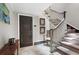 Stairway with carpeted stairs and white-painted wood banister at 2525 Peachtree Rd # 28, Atlanta, GA 30305