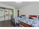 Shared bedroom with twin beds and built-in closet shelving at 2896 Tiffany Cir, Lawrenceville, GA 30044