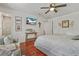 Bedroom with hardwood floors, sitting area, and ample natural light at 2896 Tiffany Cir, Lawrenceville, GA 30044