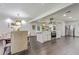 Spacious kitchen with island, stainless appliances, and adjacent dining area at 2896 Tiffany Cir, Lawrenceville, GA 30044