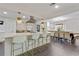 Open kitchen featuring bar seating at the island, dining area, and living space at 2896 Tiffany Cir, Lawrenceville, GA 30044