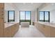 Luxury bathroom with double vanities, soaking tub and scenic outdoor views at 2425 Peachtree Rd # 1806, Atlanta, GA 30305