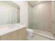Modern bathroom featuring a glass-enclosed shower and sleek vanity with stylish mirror at 2425 Peachtree Rd # 1806, Atlanta, GA 30305
