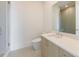 Modern bathroom featuring a glass-enclosed shower and sleek vanity with stylish mirror at 2425 Peachtree Rd # 1806, Atlanta, GA 30305