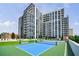 Modern luxury apartment complex with beautiful landscaping and community spaces at 2425 Peachtree Rd # 1806, Atlanta, GA 30305