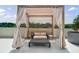 Outdoor cabana features comfortable seating perfect for relaxation while overlooking the neighborhood at 2425 Peachtree Rd # 1806, Atlanta, GA 30305