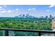 Balcony view overlooking the lush green scenery and Atlanta skyline at 2425 Peachtree Rd # 1806, Atlanta, GA 30305