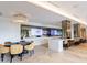 Elegant common room featuring poker table, tvs, and comfortable seating for socializing and entertainment at 2425 Peachtree Rd # 1806, Atlanta, GA 30305