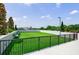 Well-maintained rooftop dog park with green turf at 2425 Peachtree Rd # 1806, Atlanta, GA 30305