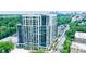 A modern condo building showcasing beautiful architectural details and floor-to-ceiling windows at 2425 Peachtree Rd # 1806, Atlanta, GA 30305