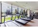 Modern fitness center featuring treadmills, elliptical, and expansive windows with scenic outdoor views at 2425 Peachtree Rd # 1806, Atlanta, GA 30305