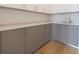 Bright kitchen showcases custom cabinetry, light countertops, and hardwood flooring at 2425 Peachtree Rd # 1806, Atlanta, GA 30305