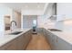 Open concept kitchen with stainless steel appliances and quartz countertops at 2425 Peachtree Rd # 1806, Atlanta, GA 30305