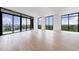 Bright and spacious living room with floor-to-ceiling windows offering panoramic city views at 2425 Peachtree Rd # 1806, Atlanta, GA 30305