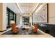 Expansive lounge with high ceilings, modern art, and ample seating for residents and guests at 2425 Peachtree Rd # 1806, Atlanta, GA 30305