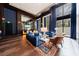 Comfortable resident lounge features elegant seating, a large screen TV, and stylish decor at 2425 Peachtree Rd # 1806, Atlanta, GA 30305