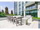 Outdoor kitchen with granite counters and high end BBQ's, perfect for grilling while overlooking the skyline at 2425 Peachtree Rd # 1806, Atlanta, GA 30305
