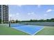 Pickle ball court on property rooftop with a view of the city at 2425 Peachtree Rd # 1806, Atlanta, GA 30305