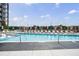 Relaxing pool area featuring lounge chairs, cabanas, and clear blue water for a resort-style living experience at 2425 Peachtree Rd # 1806, Atlanta, GA 30305