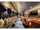 Cozy theater room with reclining chairs and a large TV screen at 2425 Peachtree Rd # 1806, Atlanta, GA 30305