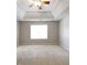 This carpeted bedroom features a ceiling fan and a window that provides plenty of natural light at 260 Redding Rdg, Atlanta, GA 30349