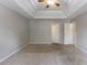 This carpeted bedroom has neutral paint and two white doors, and it gets great natural light at 260 Redding Rdg, Atlanta, GA 30349